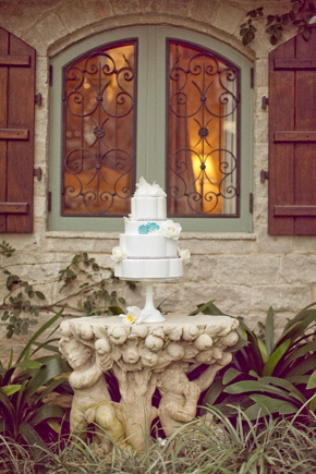 white and teal wedding cake